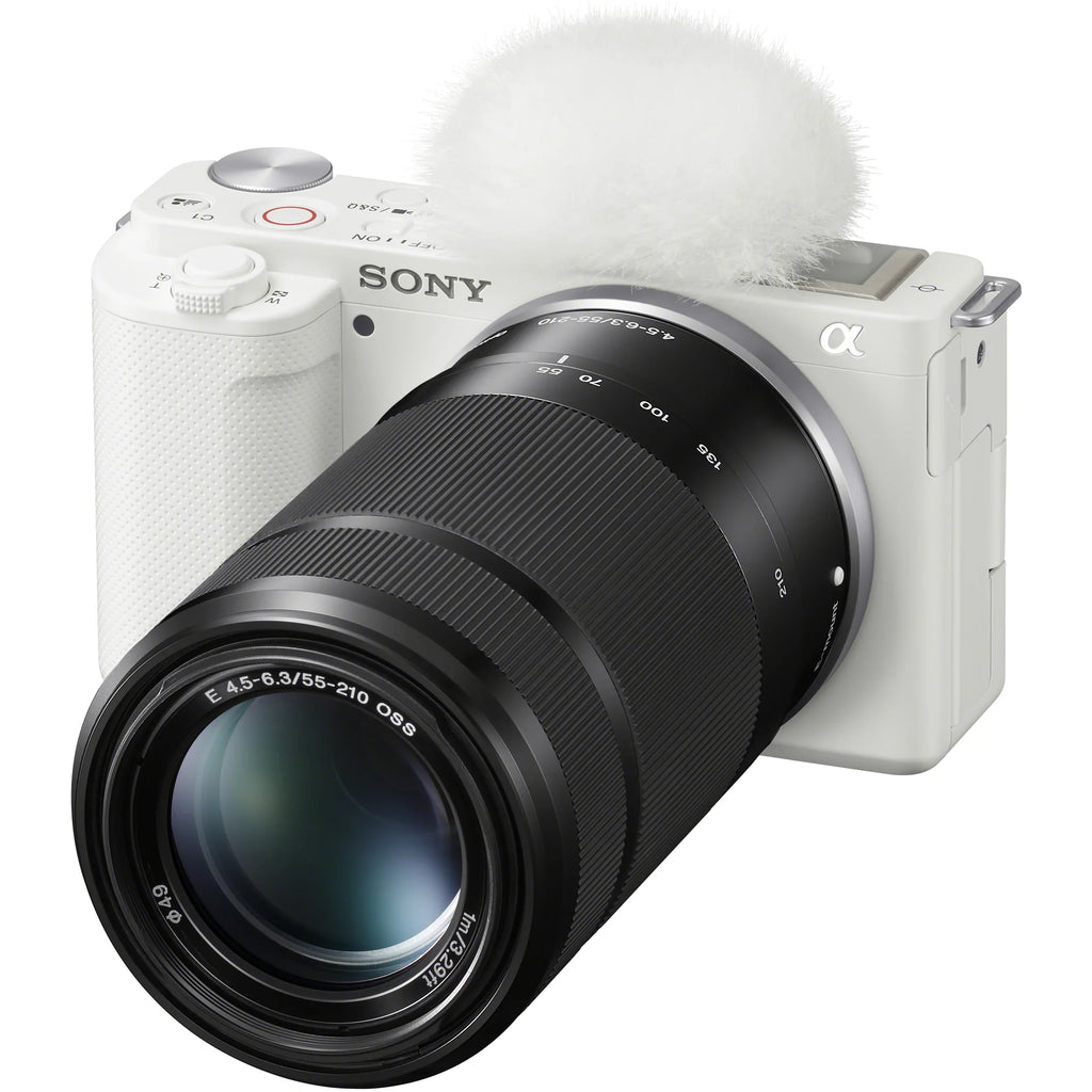 Sony ZV-E10 Mirrorless Alpha APS-C Vlog Camera 2 Lens Kit 16-50mm + 55-210mm ILCZV-E10L/W White Bundle with Deco Gear Case + Filter Set + Wide Angle & Telephoto Lenses + Extra Battery & Accessories